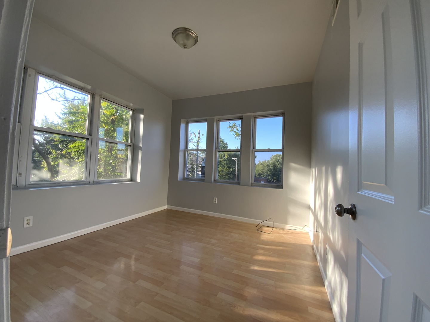 6508 South Morgan Street, Unit 3 Chicago, IL 60621 - Photo 9 of 11 a view of an empty room with a window
