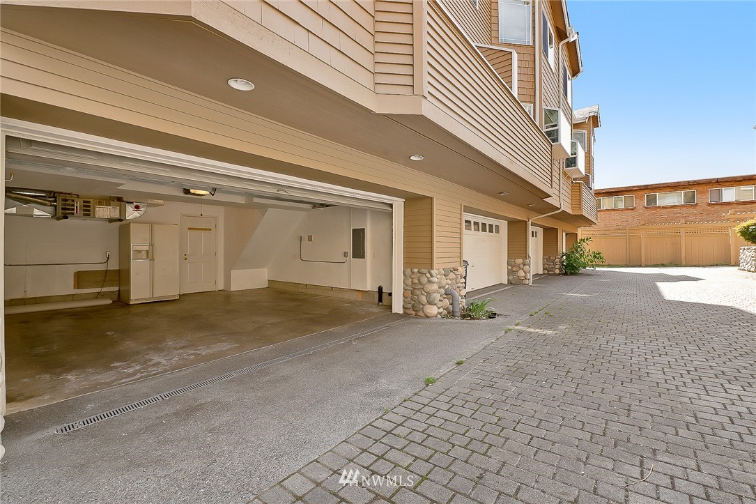 420 Northeast Maple Leaf Place, Unit B Seattle, WA 98115 - Photo 14 of 24 a view of a parking space in front of a house