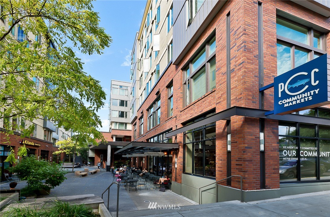 420 Northeast Maple Leaf Place, Unit B Seattle, WA 98115 - Photo 20 of 24 a view of a building with a tree