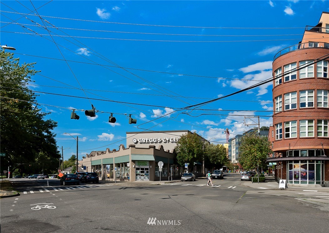 420 Northeast Maple Leaf Place, Unit B Seattle, WA 98115 - Photo 21 of 24 a view of a building with a street