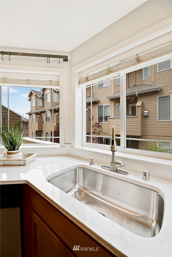 420 Northeast Maple Leaf Place, Unit B Seattle, WA 98115 - Photo 4 of 24 a close view of sink and tap
