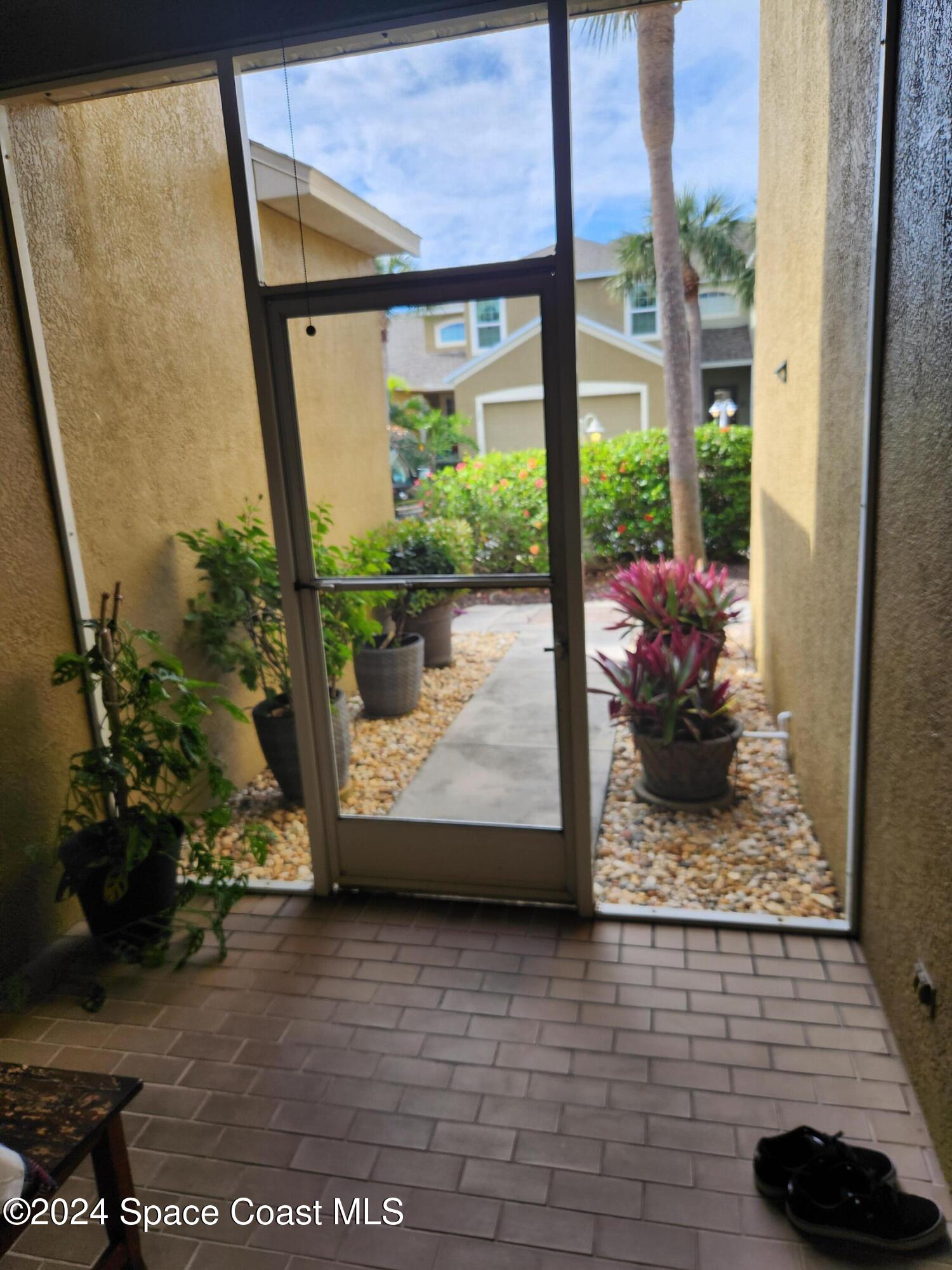 373 Intrepid Way Indialantic, FL 32903 - Photo 49 of 59 Front Screen Porch