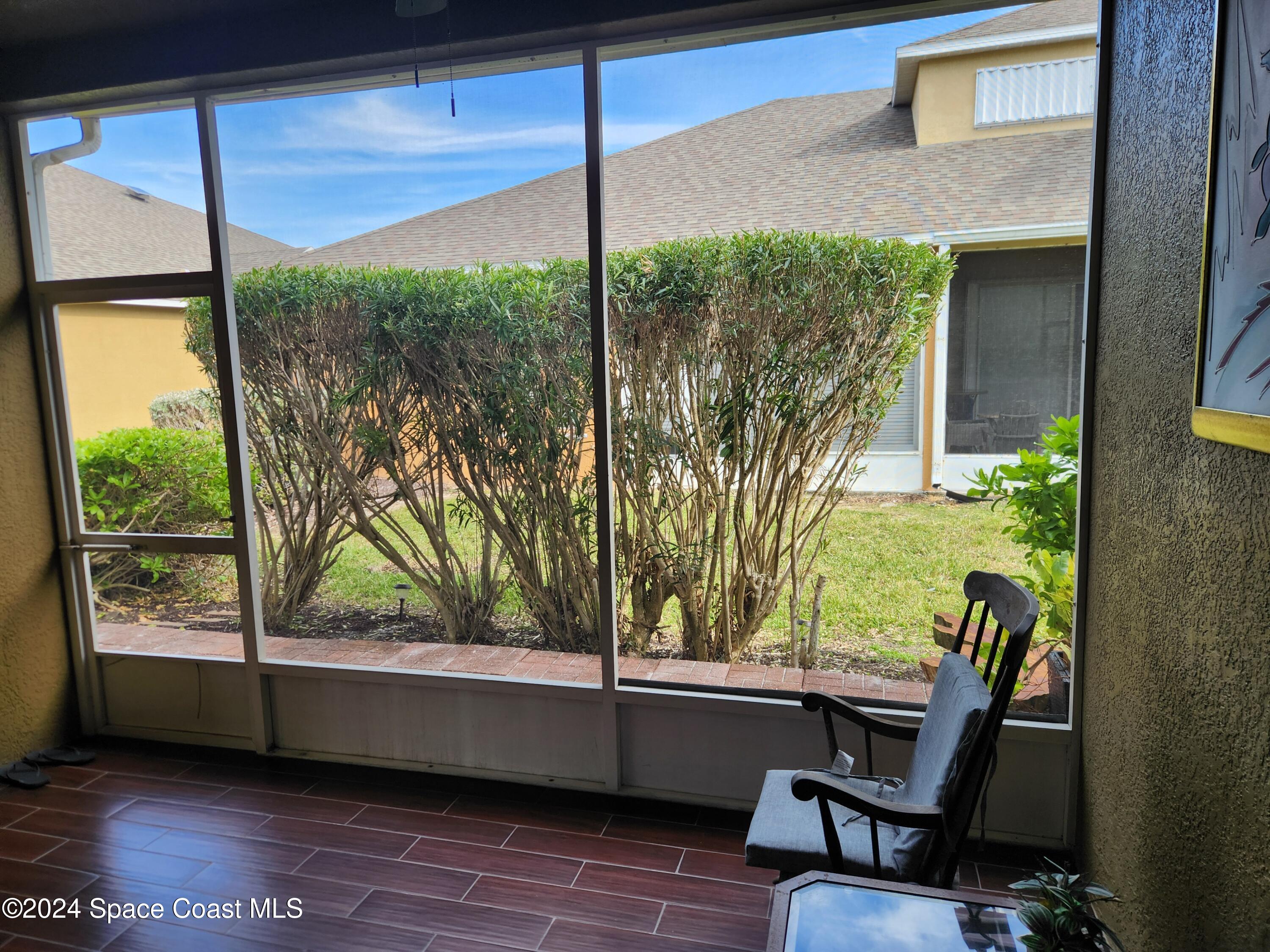 373 Intrepid Way Indialantic, FL 32903 - Photo 9 of 59 a view of a two chairs in the balcony