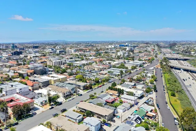 an aerial view of a city with lots of residential buildings