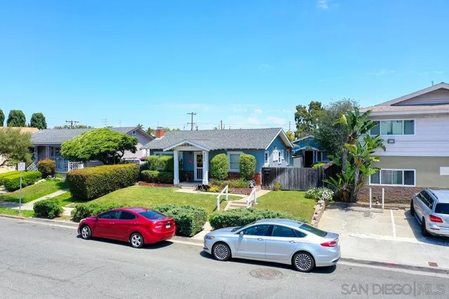 a car parked in front of a house