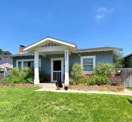 a view of kitchen with wooden floor