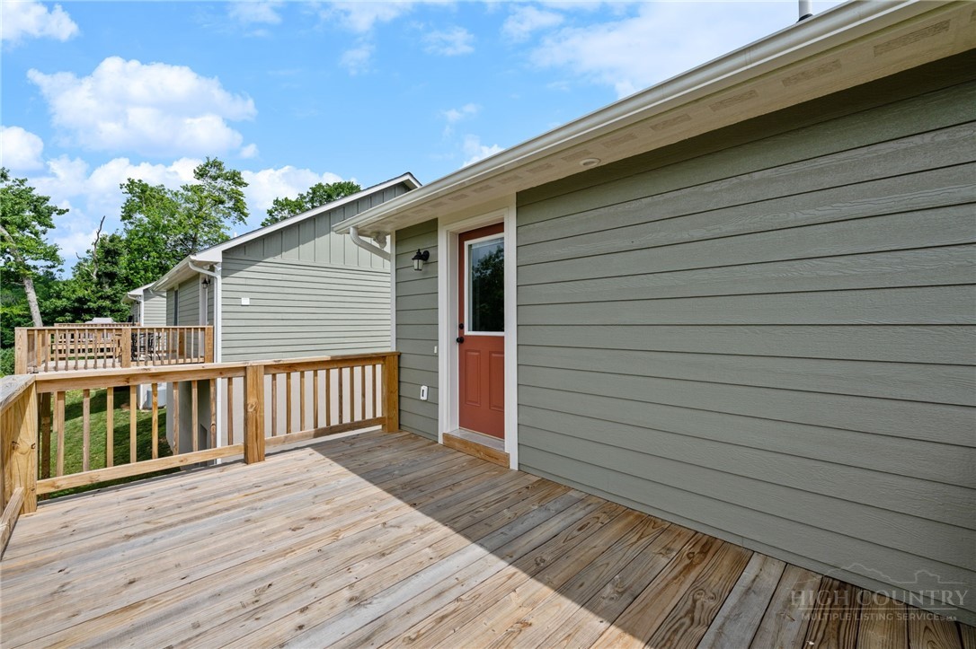 245 Ava Way, Unit 108 Boone, NC 28607 - Photo 5 of 31 a view of a wooden deck