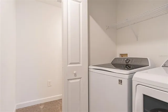 a bedroom with double bed and a window