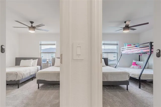 a view of swimming pool with outdoor seating and plants