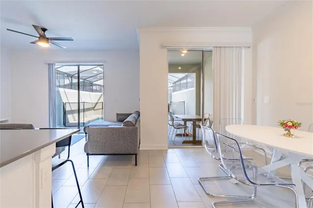 a kitchen with stainless steel appliances a refrigerator and a stove top oven