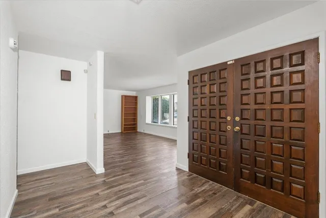 a view of livingroom with hardwood and furniture