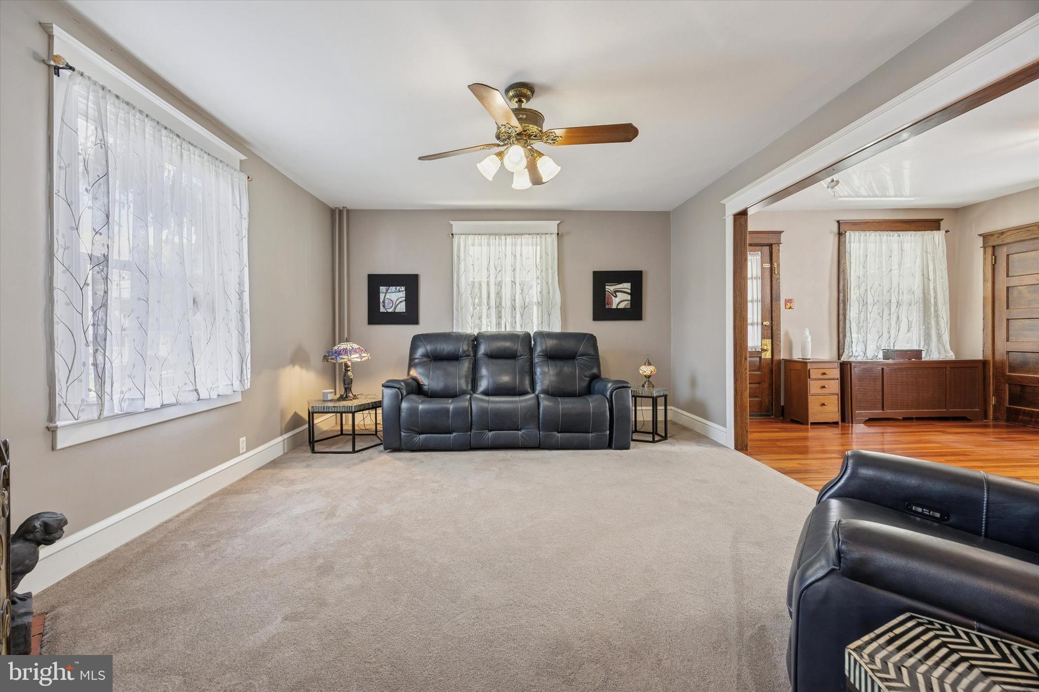 16 Chelten Road Havertown, PA 19083 - Photo 12 of 24 a living room with furniture and a large window