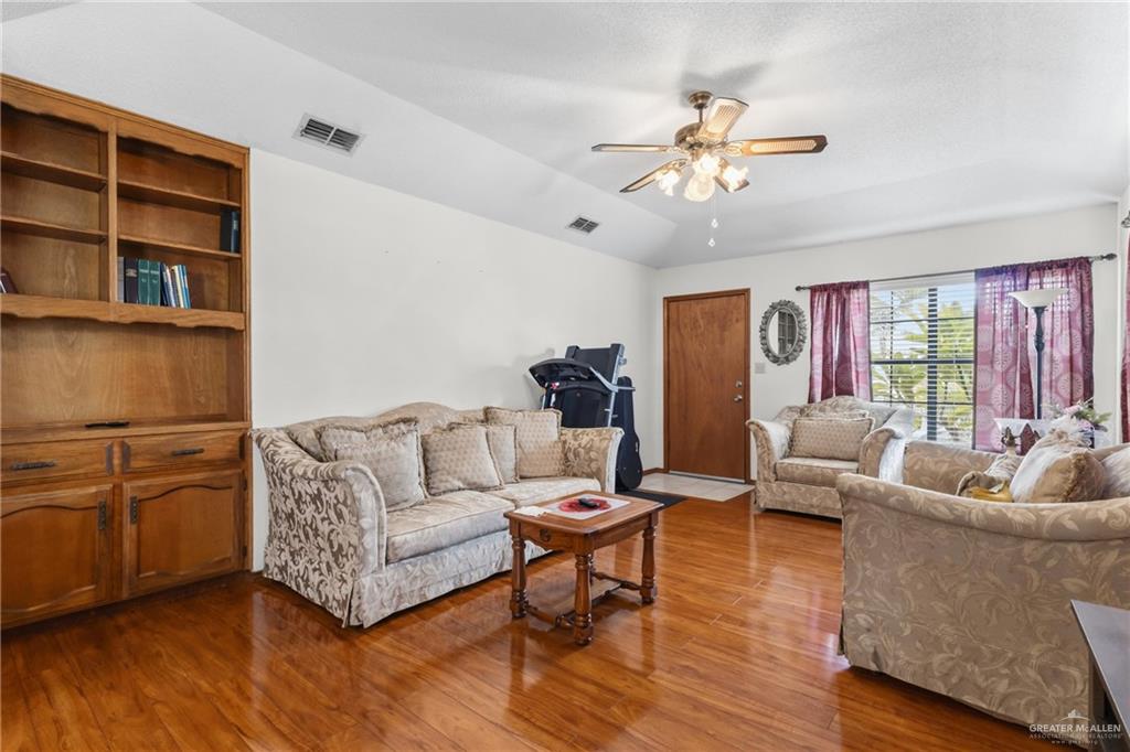 1909 Tyler Street Mission, TX 78572 - Photo 10 of 17 a living room with furniture and a large window