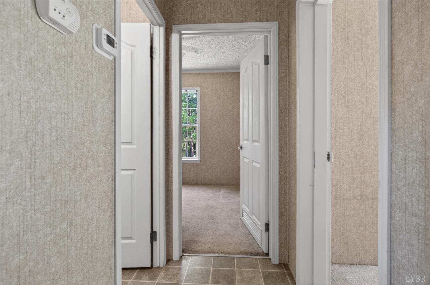1811 Mohawk Road Gladys, VA 24554 - Photo 19 of 51 a view of a bathroom from a corridor