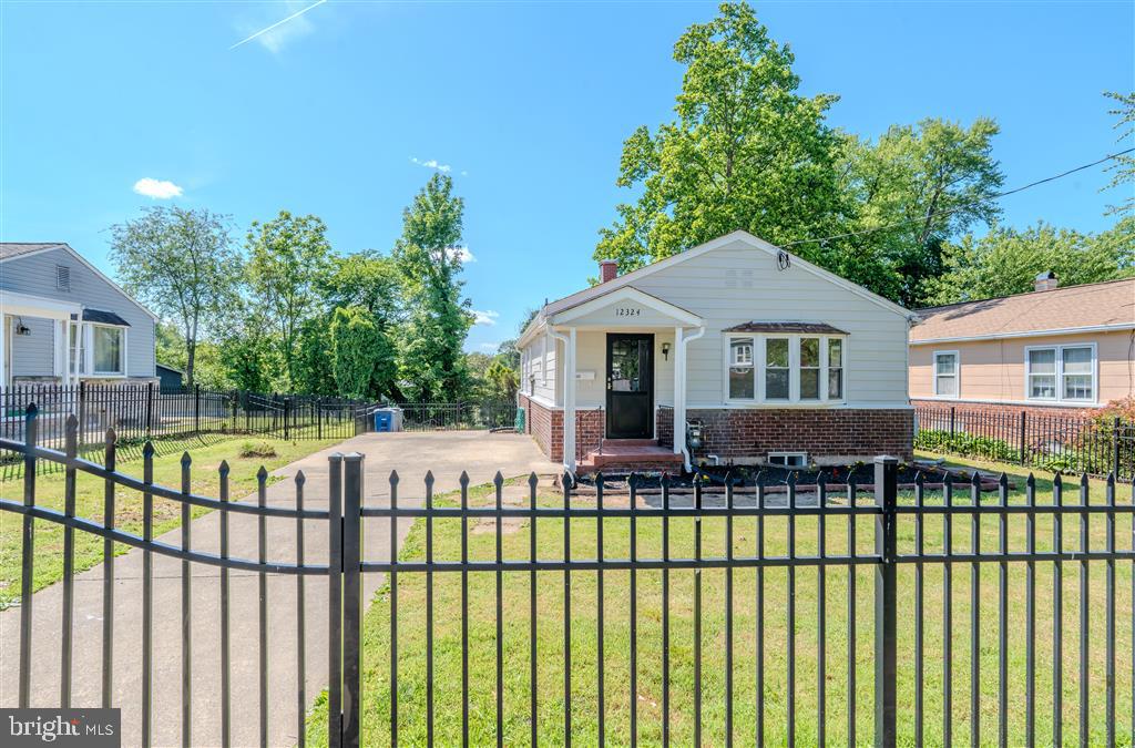 12324 Centerhill Street Silver Spring, MD 20902 - Photo 1 of 24 a view of a house with a deck