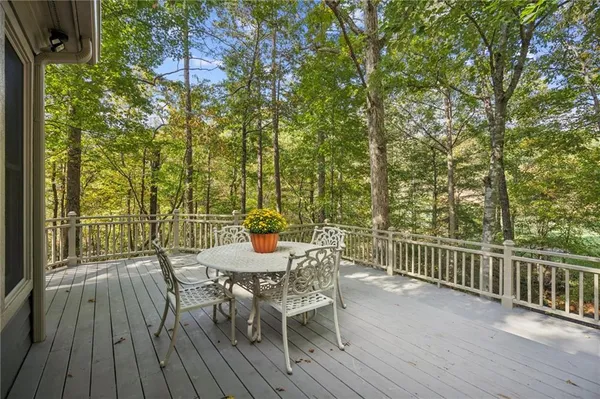 a view of a table and chairs in the patio