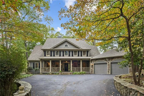 front view of a house with a garden