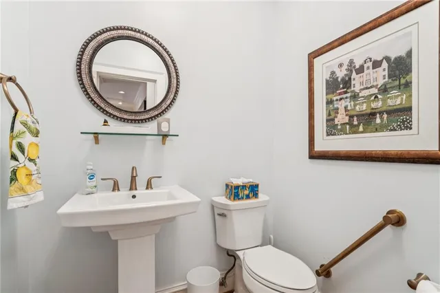 a bedroom with two beds and windows