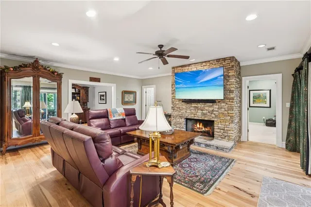 a bathroom with a sink mirror and toilet