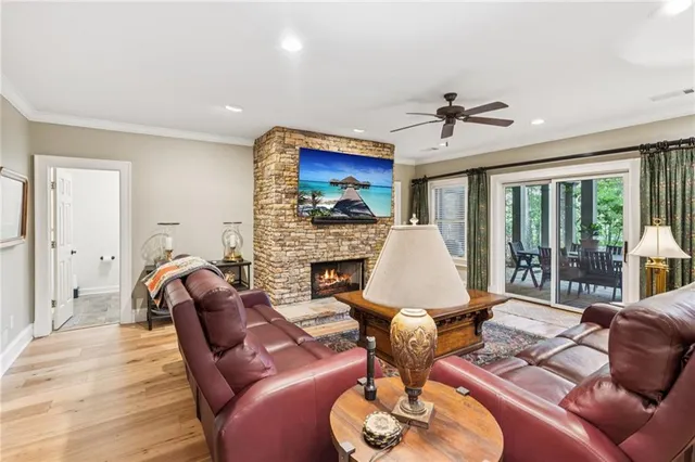 a bed room with furniture and a flat screen tv