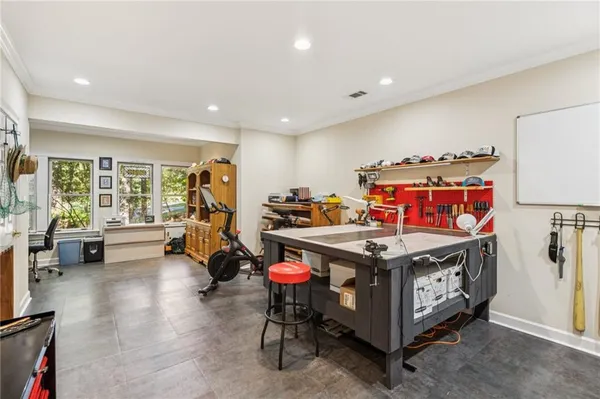 a view of a patio with a table chairs and a backyard