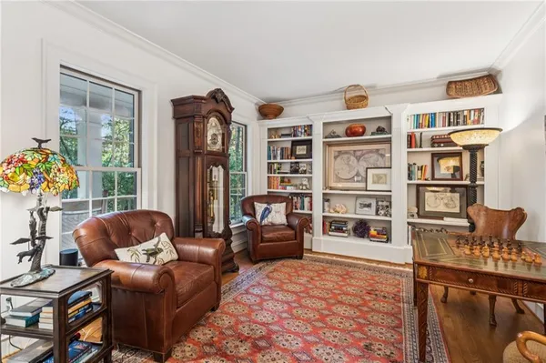 a view of a dining room with furniture window and outside view