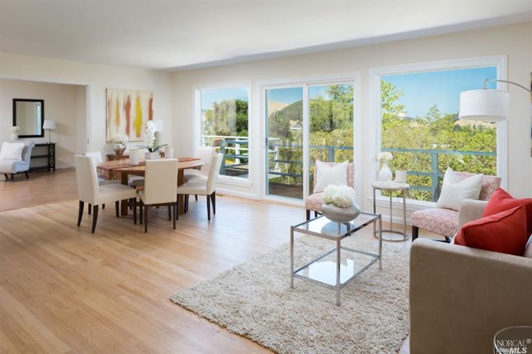 548 Montecillo Road San Rafael, CA 94903 - Photo 1 of 1 a living room with furniture a rug a lamp and a large window