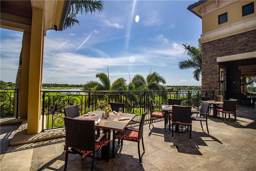 9419 Piacere Way Naples, FL 34113 - Photo 19 of 19 a view of a chairs and table in patio