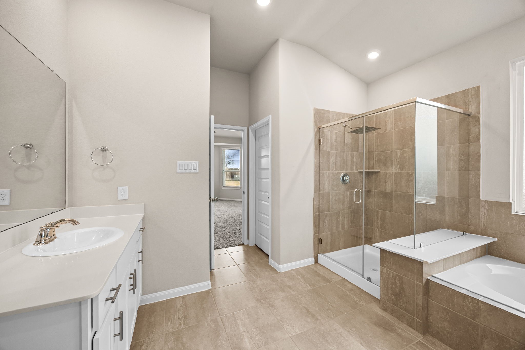 2406 Temple Crag Drive Rosharon, TX 77583 - Photo 16 of 26 This pretty bath is the perfect place to get ready for a busy day and to unwind and relax at the end of a long, hectic day.