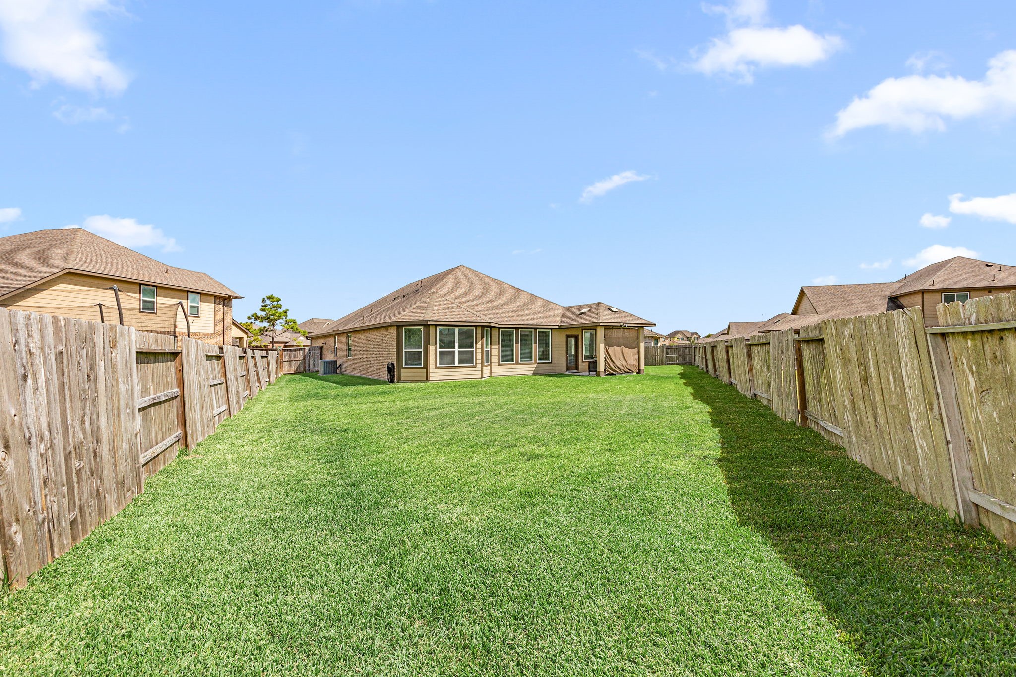 2406 Temple Crag Drive Rosharon, TX 77583 - Photo 24 of 26 This spacious, sun-drenched yard is a gardener's dream and is just waiting for you to plan and plant your own vegetable garden. Welcome home!