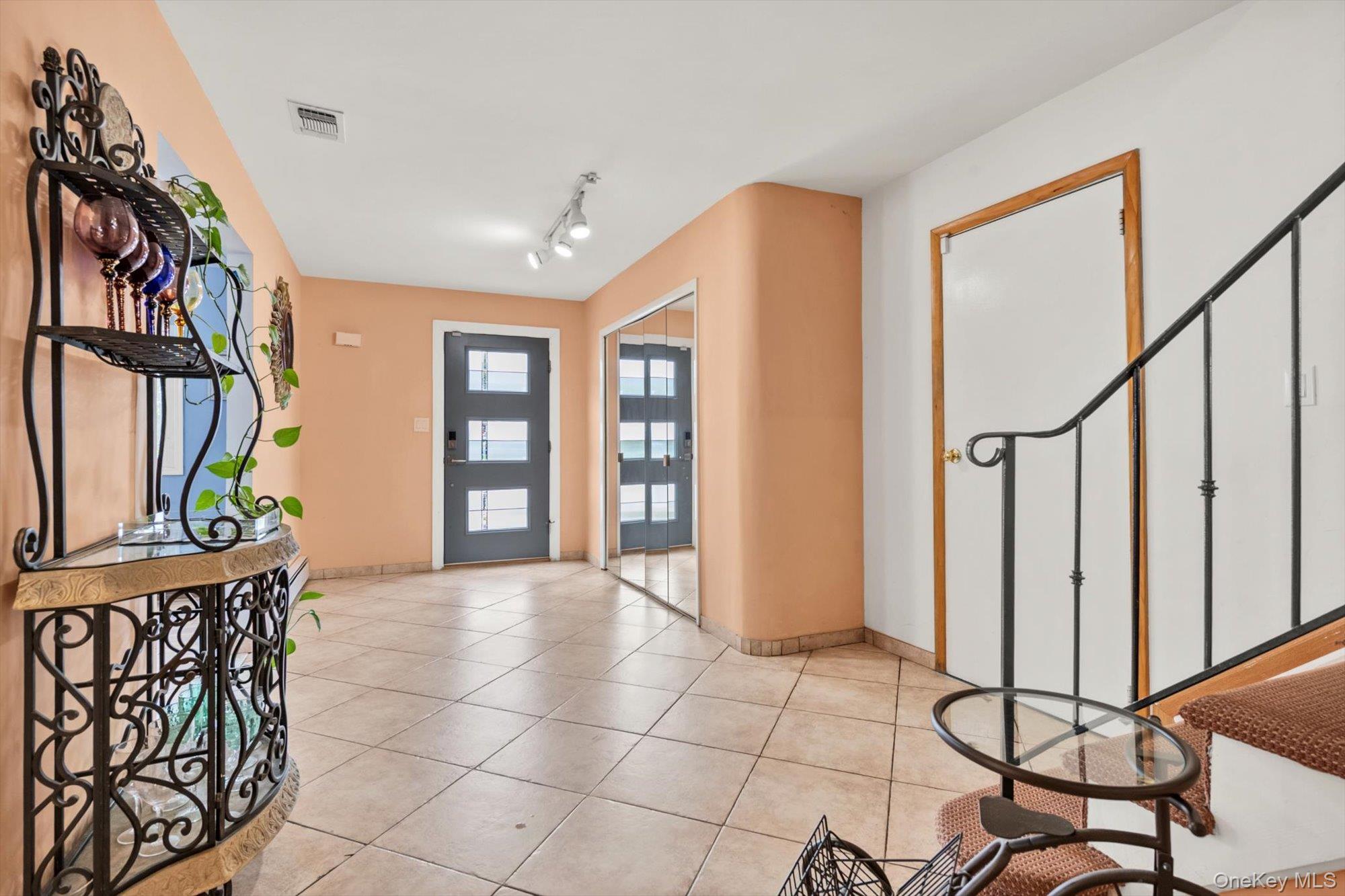 713 Hungry Harbor Road Valley Stream, NY 11581 - Photo 2 of 25 a view of an entryway with a window
