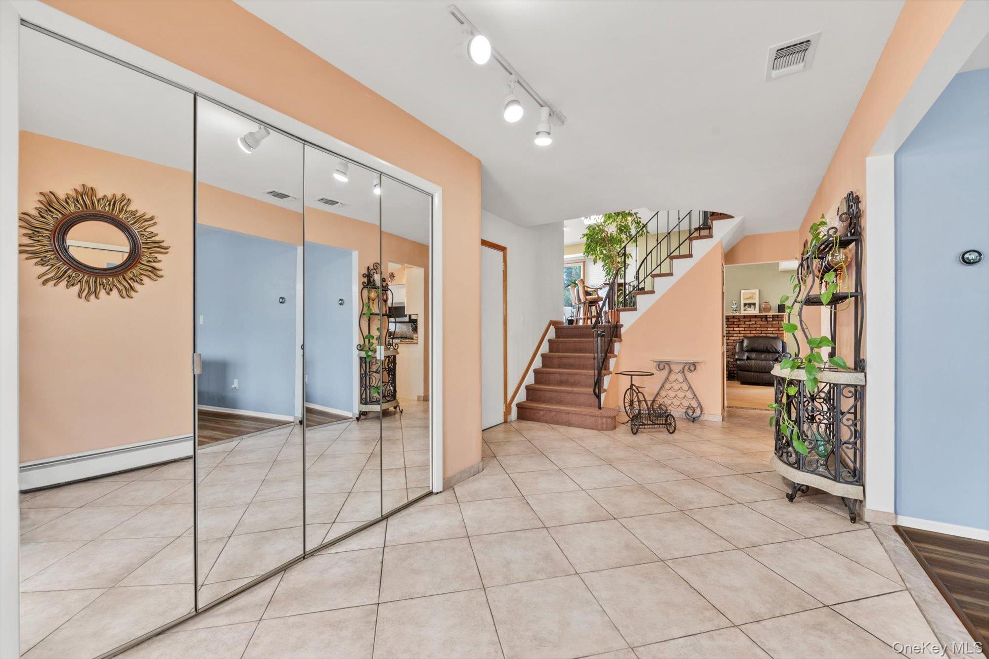 713 Hungry Harbor Road Valley Stream, NY 11581 - Photo 3 of 25 a view of an entryway with staircase