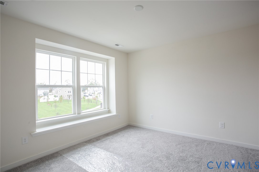 4830 Tuscany Road Moseley, VA 23120 - Photo 17 of 23 an empty room with a window