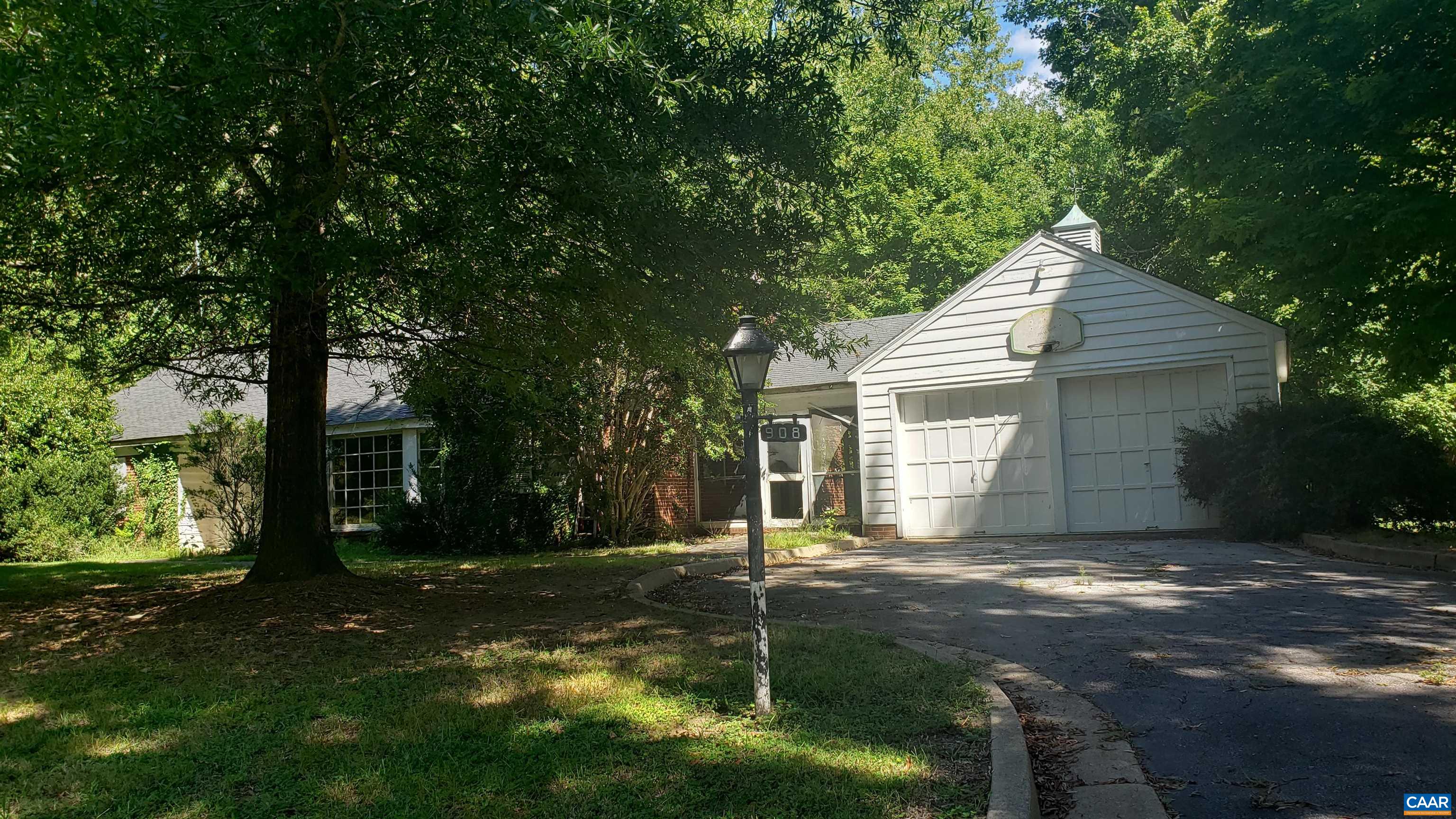 0 North Main Street Farmville, VA 23901 - Photo 2 of 4 a backyard of a house with plants and large tree