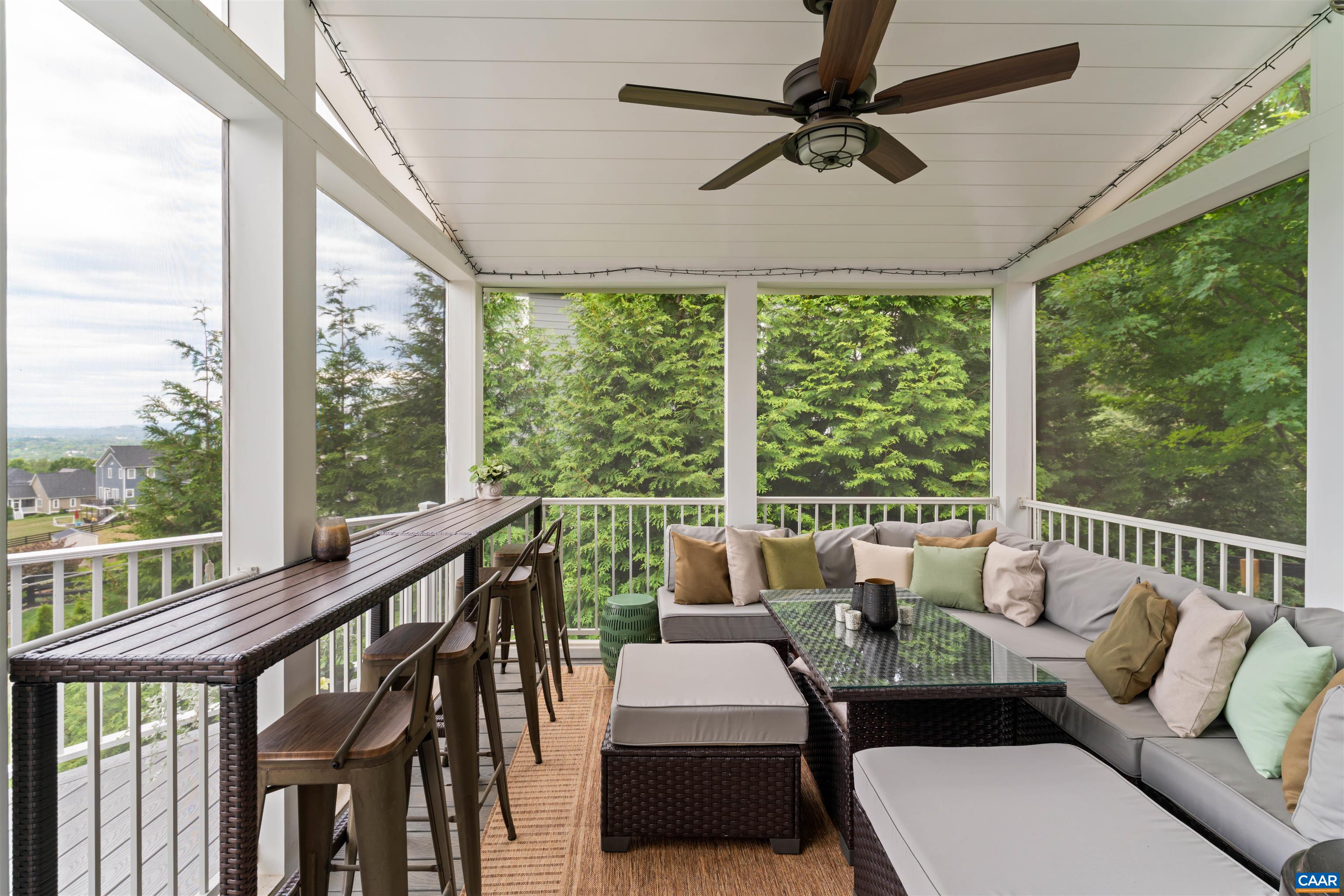 2246 Hyland Ridge Drive Charlottesville, VA 22911 - Photo 17 of 53 a balcony with furniture and a large window