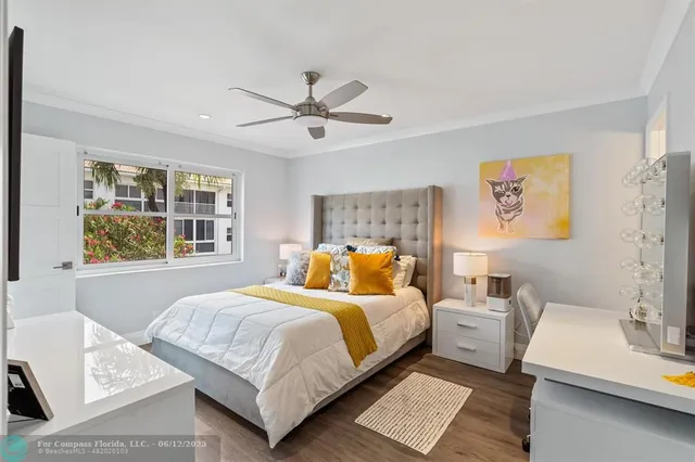 a view of a living room and a balcony