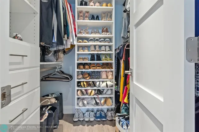 a view of a building with garden and plants