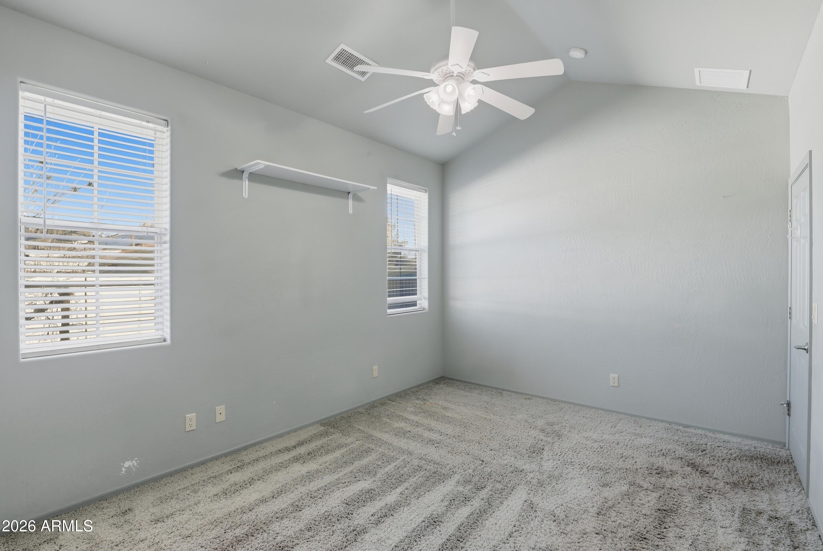 228 Windmill Road Payson, AZ 85541 - Photo 23 of 42 a view of an empty room with a window
