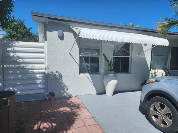 a view of a house with a porch