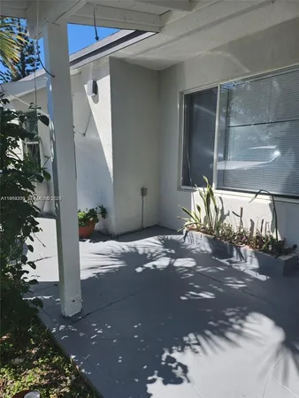 a view of a backyard of a house