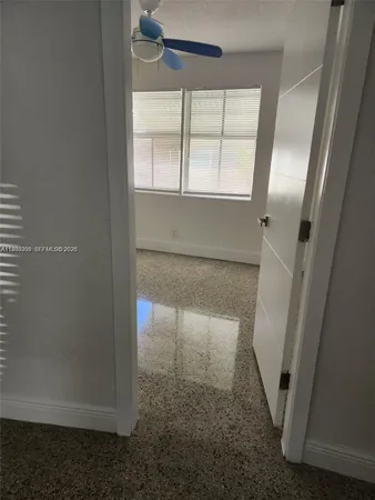an entryway door with a glass door