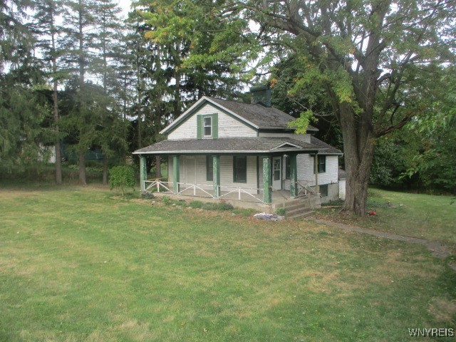 11714 Main Street Newstead, NY 14001 - Photo 1 of 11 front wrap around porch