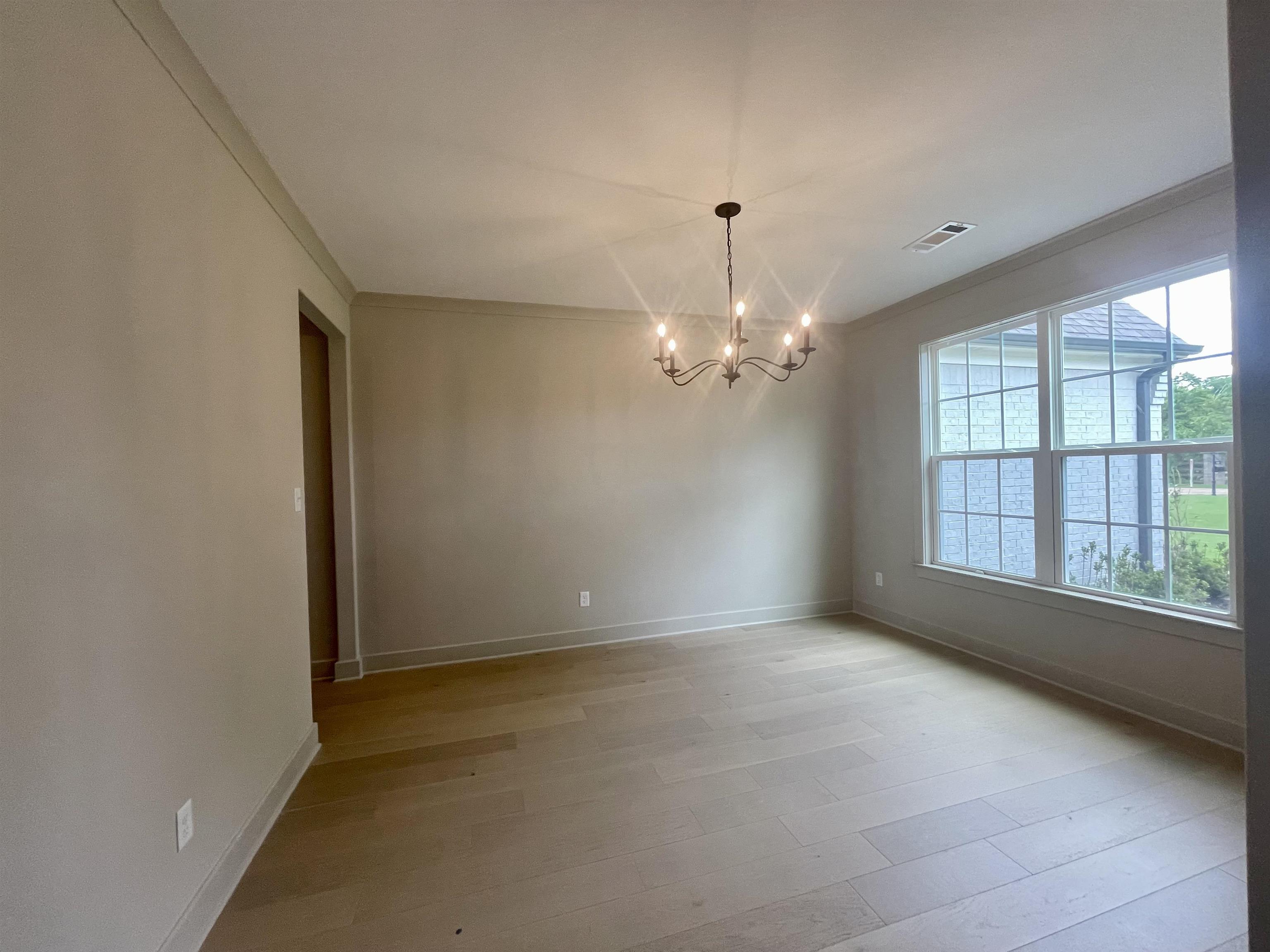 11162 Shelby Post Road Collierville, TN 38017 - Photo 11 of 23 a view of an empty room with a window