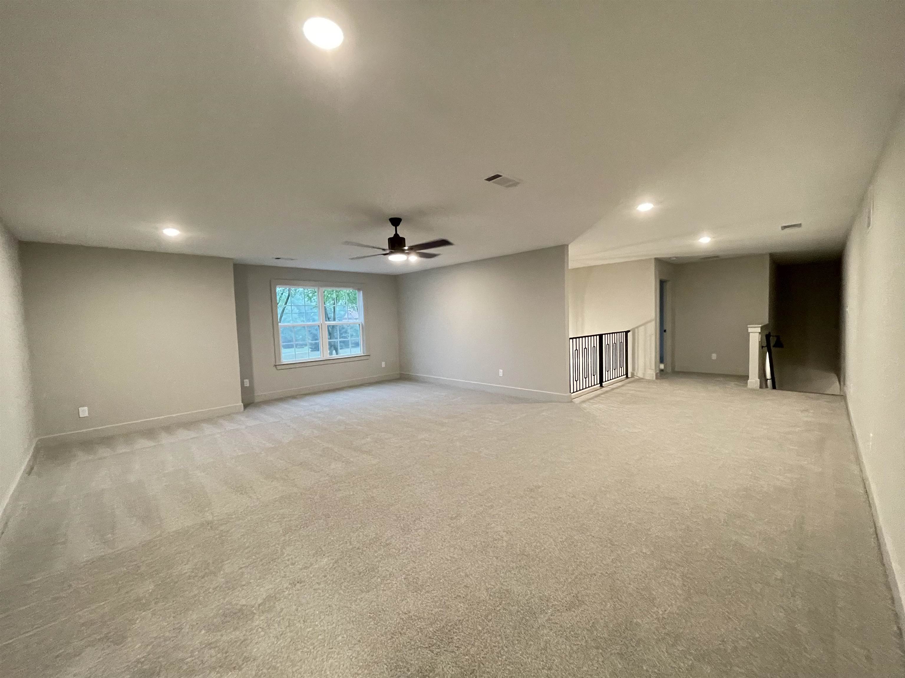 11162 Shelby Post Road Collierville, TN 38017 - Photo 12 of 23 an empty room with window and pillar in it
