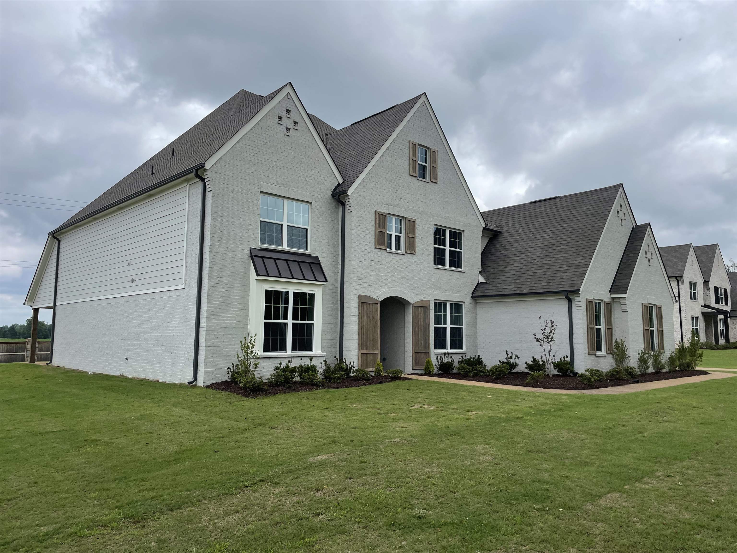 11162 Shelby Post Road Collierville, TN 38017 - Photo 2 of 23 a front view of a house with a yard