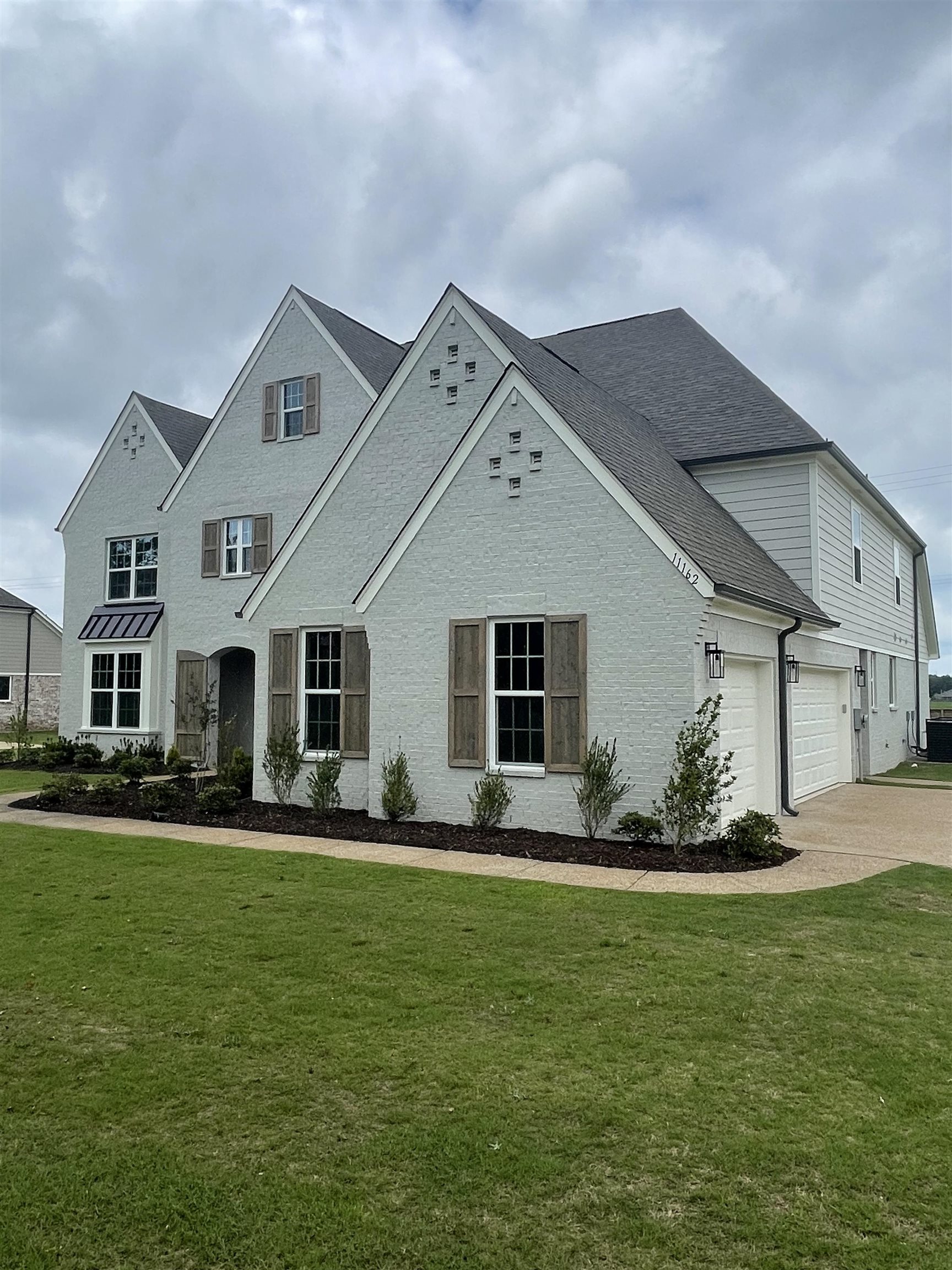 11162 Shelby Post Road Collierville, TN 38017 - Photo 3 of 23 a front view of house with yard