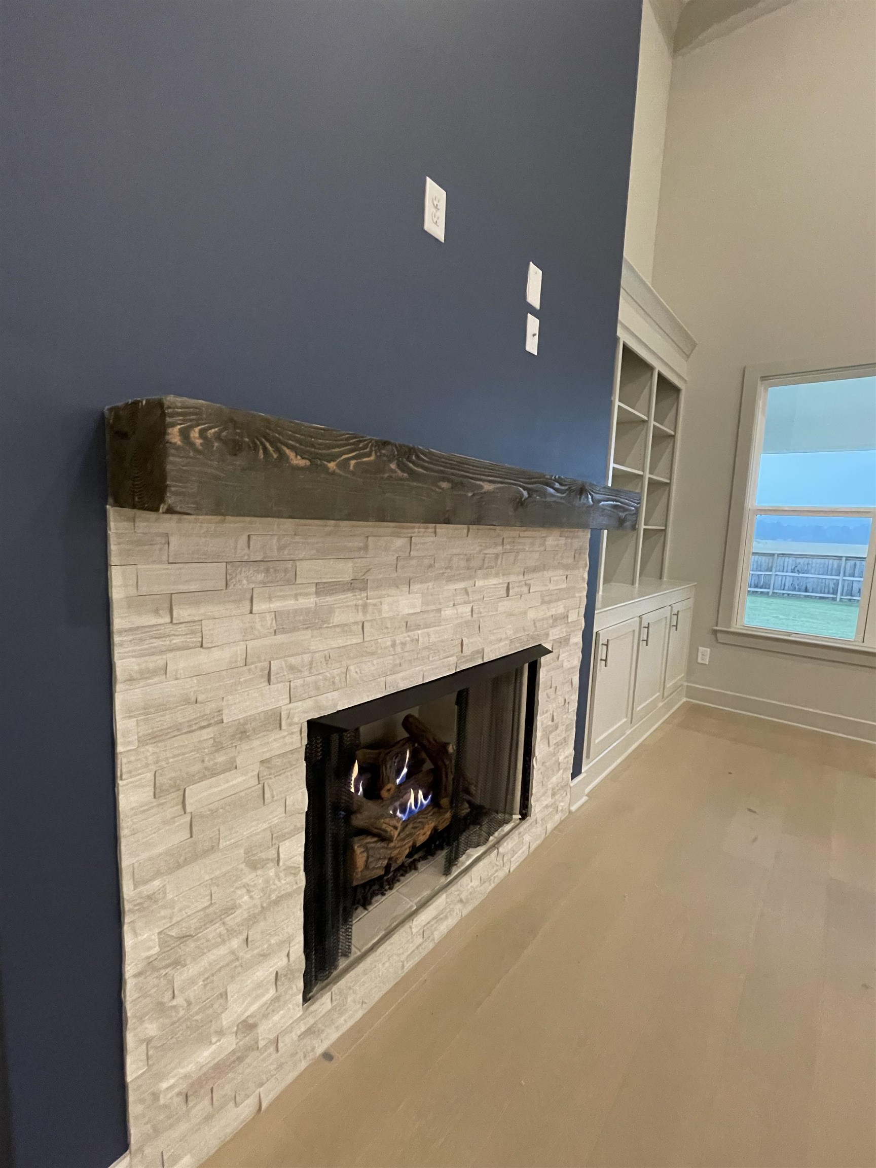 11162 Shelby Post Road Collierville, TN 38017 - Photo 6 of 23 a living room with a fireplace