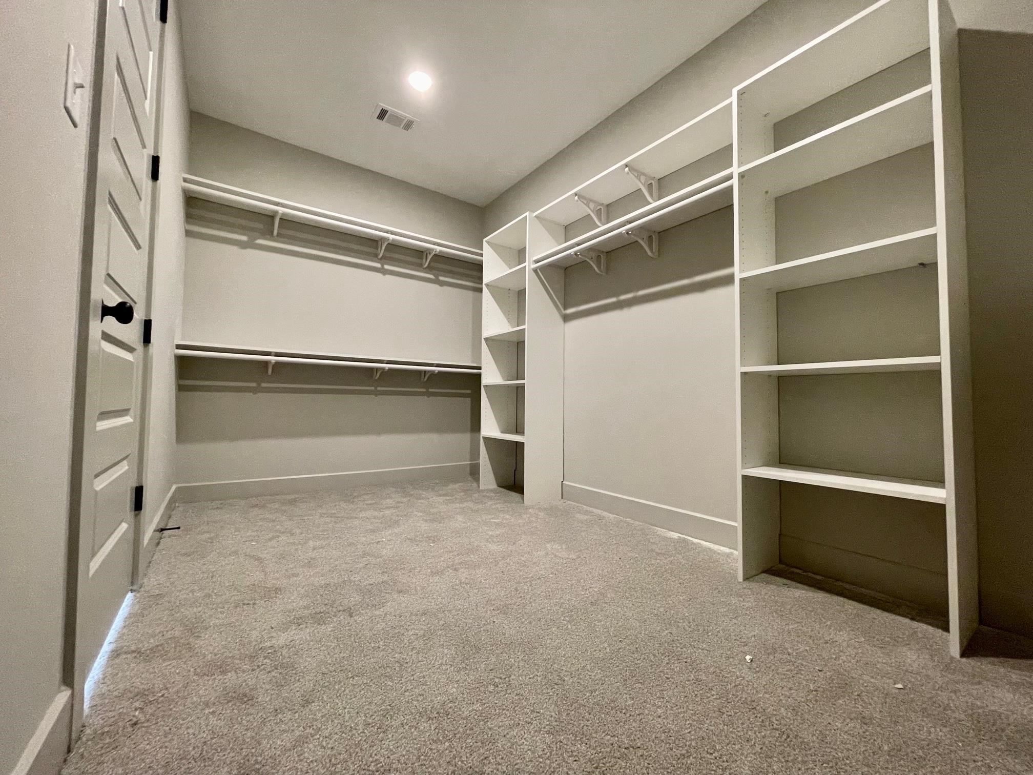 11162 Shelby Post Road Collierville, TN 38017 - Photo 10 of 23 a view of an empty room with empty shelves