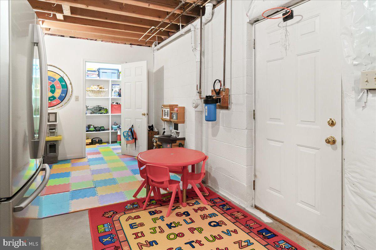 2428 Cobblestone Way Frederick, MD 21702 - Photo 41 of 83 walk up stairs to bilco basement doors