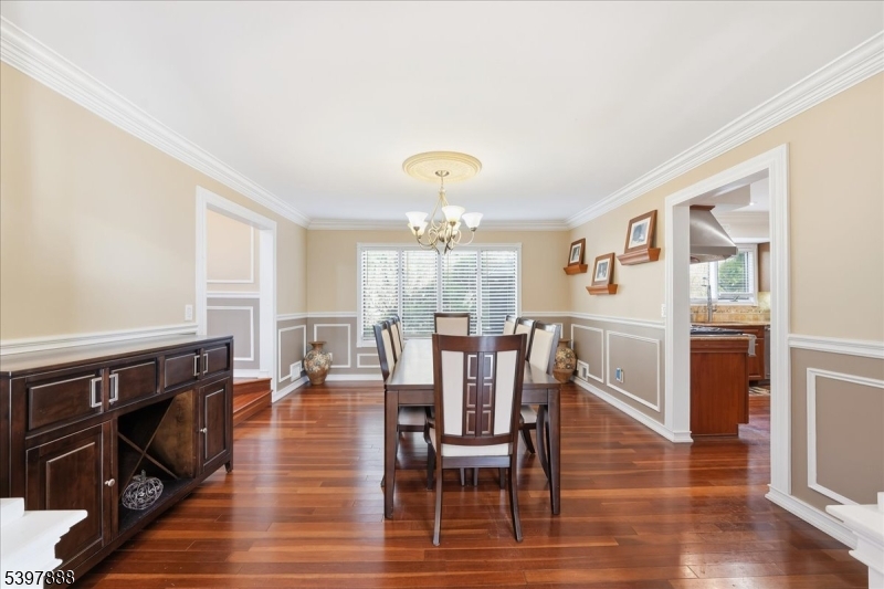 1605 Justin Place, Unit 1 Mountainside, NJ 07092 - Photo 20 of 43 a view of a dining room with furniture window and wooden floor